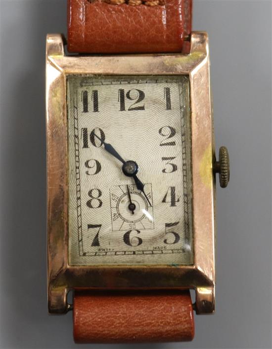 A gentlemans 1930s 9ct gold rectangular cased manual wind wrist watch.